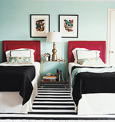 Twin guest room with eggshell blue paint
